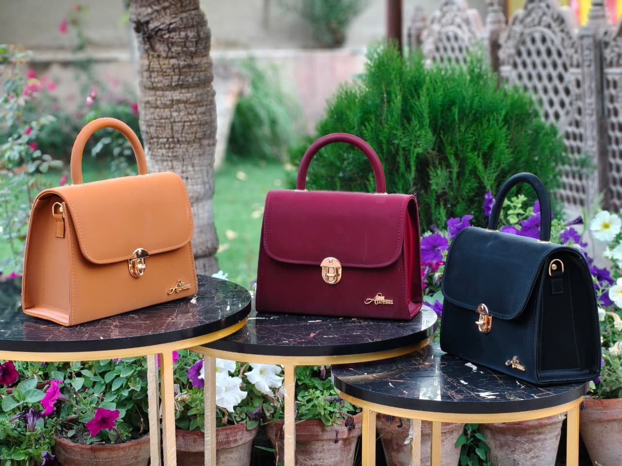 Auressa structured mini handbags